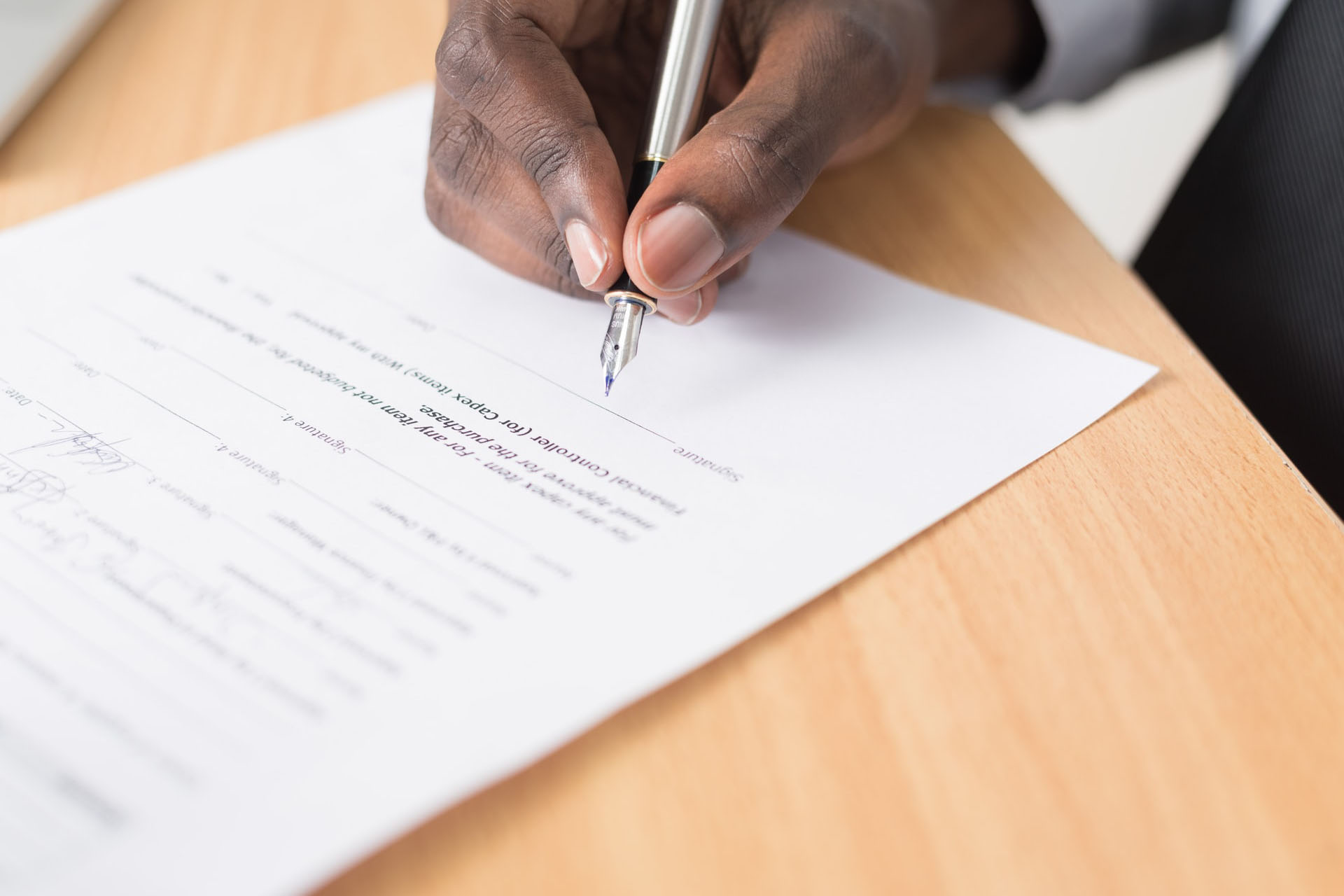 Man signing documents